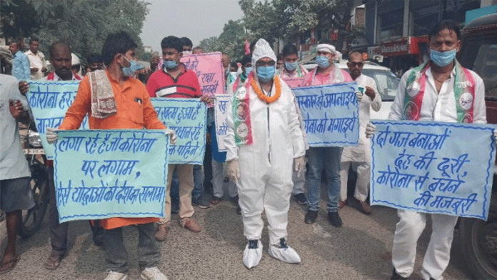 PPE किट पहनकर नामांकन करने पहुँचे जाप उम्मीदवार, सोशल डिस्टेंसिंग का किया पालन 15